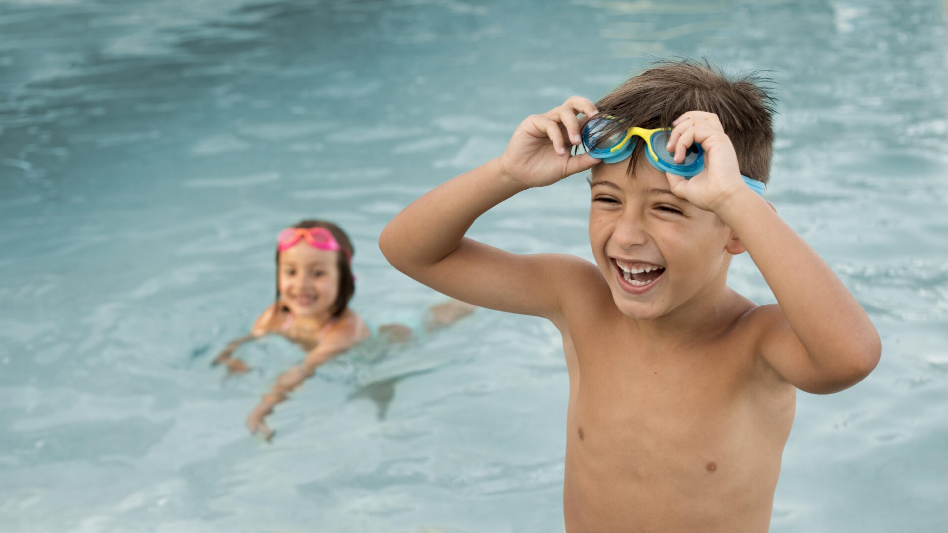 medium shot kids having fun pool